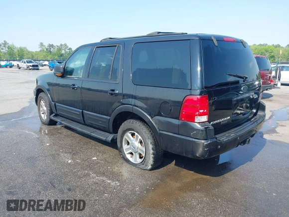 2004 Ford Expedition Eddie Bauer with VIN 1FMPU17L54LA74068, listed as a IAAI auction lot 41974666 with 292,308 mi miles. Bid and sale history available at carsss.com. Image 3.