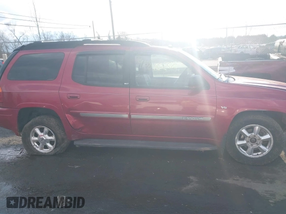 2005 GMC Envoy SLT z VIN 1GKET16M956158147, wystawiony jako IAAI lot #41683236 z przebiegiem Nie podano mil oraz . Historia ofert i sprzedaży dostępna na DreamBid. Obrazek 13.