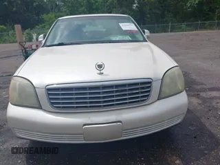 2003 Cadillac DeVille z VIN 1G6KD54Y03U182728, wystawiony jako IAAI lot #42080577 z przebiegiem 193 152 mil mil oraz . Historia ofert i sprzedaży dostępna na DreamBid. Obrazek 12.