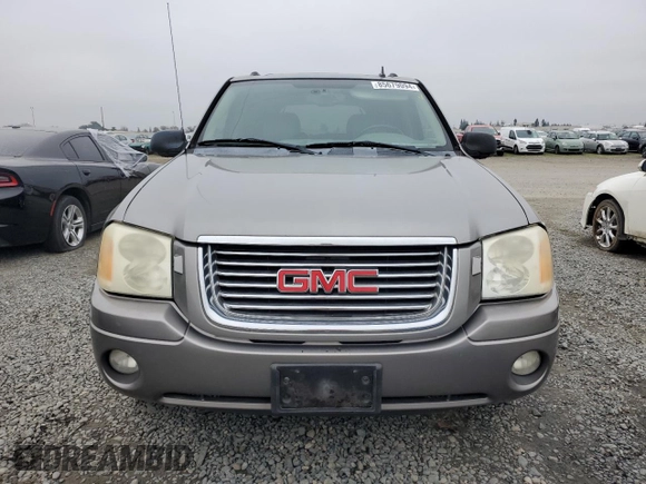 2006 GMC Envoy SLT with VIN 1GKDS13S962138197, listed as a Copart auction lot 85679094 with 166,376 mi miles and Salvage Title. Bid and sale history available at carsss.com. Image 5.