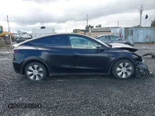 2022 Tesla Model Y Long Range z VIN 7SAYGDEE4NF447985, wystawiony jako IAAI lot #41811782 z przebiegiem 81 973 mil mil oraz . Historia ofert i sprzedaży dostępna na DreamBid. Obrazek 12.