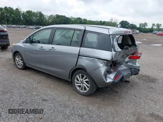 2014 Mazda 5 Sport z VIN JM1CW2BL5E0172594, wystawiony jako IAAI lot #42628707 z przebiegiem 180 369 mil mil oraz . Historia ofert i sprzedaży dostępna na DreamBid. Obrazek 3.