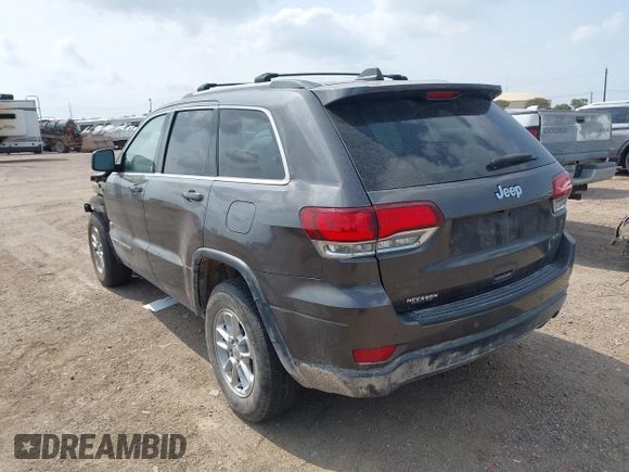 2020 Jeep Grand Cherokee Laredo E with VIN 1C4RJEAG2LC284912, listed as a IAAI auction lot 42114881 with 86,579 mi miles and . Bid and sale history available at DreamBid. Image 3.