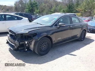 2014 Ford Fusion SE Hybrid with VIN 3FA6P0LU6ER312678, listed as a IAAI auction lot 42140117 with 103,154 mi miles. Bid and sale history available at carsss.com. Image 2.