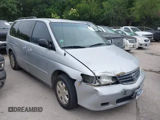 2003 Honda Odyssey EX-L z VIN 5FNRL18993B100658, wystawiony jako IAAI lot #42325058 z przebiegiem 210 042 mil mil oraz . Historia ofert i sprzedaży dostępna na DreamBid. Obrazek 1.