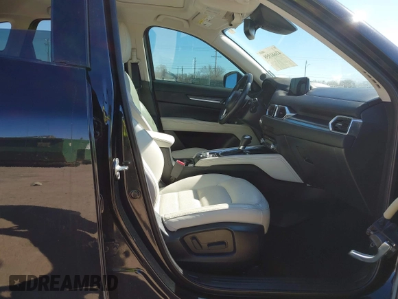 2020 Mazda CX-5 Grand Touring with VIN JM3KFBDMXL0763316, listed as a IAAI auction lot 41661958 with 64,881 mi miles and . Bid and sale history available at carsss.com. Image 5.