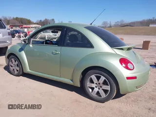 2006 Volkswagen New Beetle Coupe with VIN 3VWRR31C86M417313, listed as a IAAI auction lot 41649374 with 279,656 mi miles. Bid and sale history available at carsss.com. Image 3.