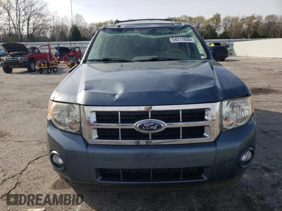 2012 Ford Escape XLT z VIN 1FMCU0D71CKA38530, wystawiony jako Copart lot #54211035 z przebiegiem 136 193 mil mil oraz Szkoda całkowita • Salvage title. Historia ofert i sprzedaży dostępna na DreamBid. Obrazek 5.
