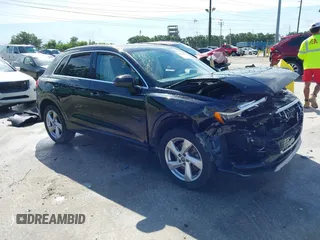 2020 Audi Q3 Premium with VIN WA1AECF33L1026593, listed as a IAAI auction lot 42470996 with 84,708 mi miles and . Bid and sale history available at DreamBid. Image 1.