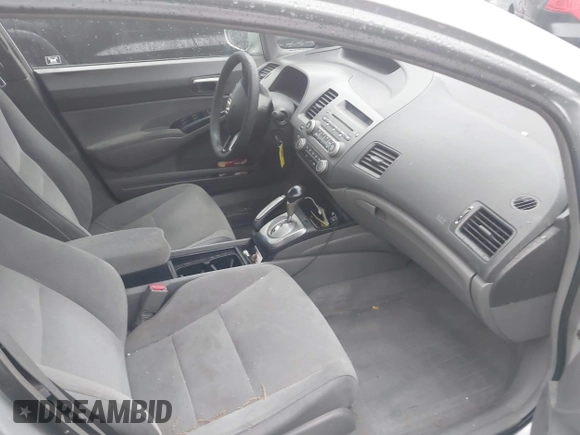 2006 Honda Civic LX with VIN 2HGFA16556H520894, listed as a IAAI auction lot 41963736 with 166,682 mi miles and . Bid and sale history available at DreamBid. Image 5.