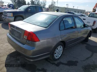 2004 Honda Civic LX with VIN 2HGES16524H565541, listed as a IAAI auction lot 41916313 with 120,537 mi miles. Bid and sale history available at carsss.com. Image 4.