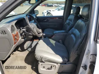 2003 GMC Envoy SLT z VIN 1GKET16S736179347, wystawiony jako Copart lot #52370775 z przebiegiem 230 623 mil mil oraz Szkoda całkowita • Salvage title. Historia ofert i sprzedaży dostępna na DreamBid. Obrazek 7.