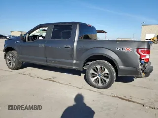 2020 Ford F-150 XL with VIN 1FTEW1CPXLKD42809, listed as a Copart auction lot 87208204 with 104,049 mi miles and Salvage Title. Bid and sale history available at carsss.com. Image 2.