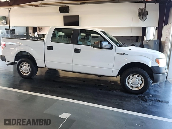 2014 Ford F-150 XL with VIN 1FTFW1EF0EKD95627, listed as a IAAI auction lot 42743975 with 228,877 mi miles and . Bid and sale history available at DreamBid. Image 26.