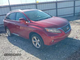 2010 Lexus RX 350 with VIN 2T2ZK1BAXAC006887, listed as a IAAI auction lot 42009698 with 208,651 mi miles. Bid and sale history available at carsss.com. Image 1.