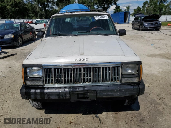 1996 Jeep Cherokee Sport with VIN 1J4FT68S4TL131956, listed as a Copart auction lot 74568064 with 174,014 mi miles and Non Repairable. Bid and sale history available at carsss.com. Image 5.