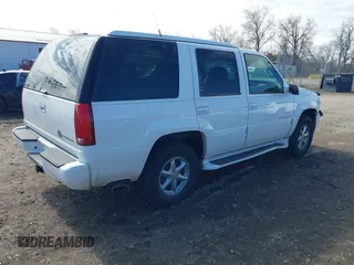 1999 Cadillac Escalade with VIN 1GYEK13R0XR415674, listed as a IAAI auction lot 40003144 with 80,959 mi miles and . Bid and sale history available at DreamBid. Image 4.