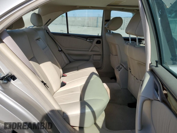 1999 Mercedes-Benz E-Class with VIN WDBJF65H5XA804902, listed as a Copart auction lot 73704634 with 92,411 mi miles and Salvage Title. Bid and sale history available at carsss.com. Image 10.