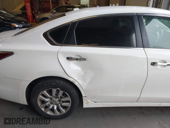 2015 Nissan Altima SV with VIN 1N4AL3AP7FC436155, listed as a IAAI auction lot 41642154 with 85,977 mi miles and . Bid and sale history available at DreamBid. Image 14.