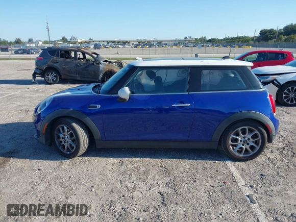 2019 MINI Hardtop Cooper with VIN WMWXP5C52K2H97728, listed as a IAAI auction lot 42026666 with 61,464 mi miles and . Bid and sale history available at DreamBid. Image 14.