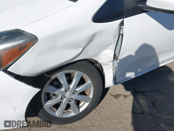 2015 Toyota Yaris L with VIN VNKKTUD34FA051863, listed as a IAAI auction lot 41615246 with 103,728 mi miles. Bid and sale history available at carsss.com. Image 6.