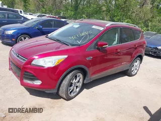 2014 Ford Escape Titanium with VIN 1FMCU0JX8EUC19300, listed as a IAAI auction lot 42138925 with 111,709 mi miles. Bid and sale history available at carsss.com. Image 2.