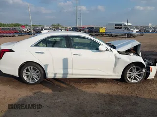 2024 Cadillac CT4 Luxury z VIN 1G6DA5RK2R0127414, wystawiony jako IAAI lot #41189546 z przebiegiem 6 383 mil mil oraz . Historia ofert i sprzedaży dostępna na DreamBid. Obrazek 13.