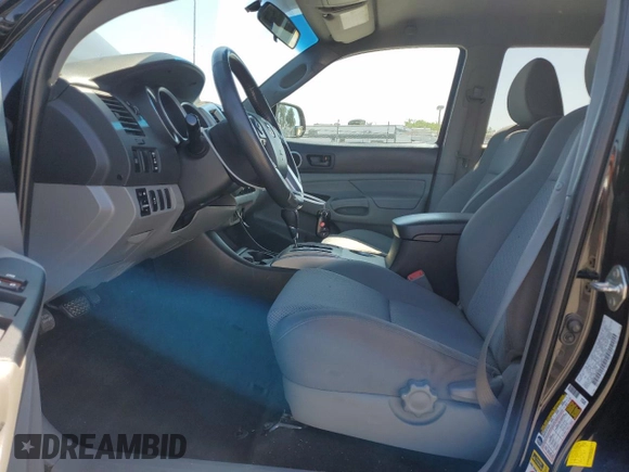 2014 Toyota Tacoma PreRunner with VIN 3TMJU4GN8EM160990, listed as a Copart auction lot 55619165 with 96,327 mi miles and Salvage Title. Bid and sale history available at DreamBid. Image 7.
