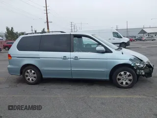 2003 Honda Odyssey EX-L with VIN 5FNRL18943B138444, listed as a IAAI auction lot 41498605 with 153,947 mi miles and . Bid and sale history available at DreamBid. Image 14.