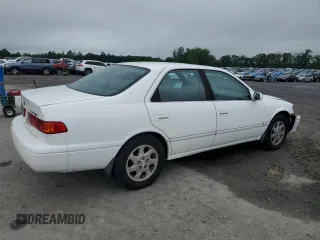 2000 Toyota Camry CE z VIN JT2BG28KXY0432024, wystawiony jako Copart lot #57057905 z przebiegiem 201 289 mil mil oraz Szkoda całkowita • Salvage title. Historia ofert i sprzedaży dostępna na DreamBid. Obrazek 3.