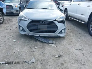 2014 Hyundai Veloster Turbo with VIN KMHTC6AE7EU199478, listed as a IAAI auction lot 41772626 with 162,985 mi miles. Bid and sale history available at carsss.com. Image 13.