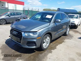 2017 Audi Q3 Premium Plus z VIN WA1JCCFS5HR003127, wystawiony jako IAAI lot #42060877 z przebiegiem 78 881 mil mil oraz . Historia ofert i sprzedaży dostępna na DreamBid. Obrazek 2.