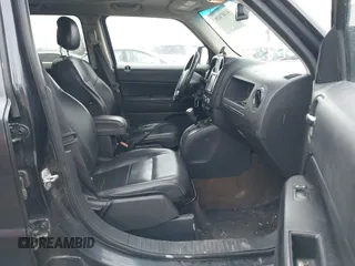 2016 Jeep Patriot Latitude with VIN 1C4NJRFB5GD545467, listed as a IAAI auction lot 41803699 with 172,398 mi miles. Bid and sale history available at carsss.com. Image 5.