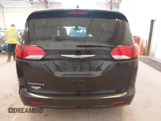 2017 Chrysler Pacifica Touring with VIN 2C4RC1DG3HR571477, listed as a IAAI auction lot 42040872 with 112,028 mi miles and . Bid and sale history available at DreamBid. Image 16.