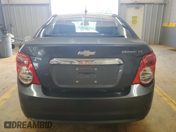 2012 Chevrolet Sonic LT with VIN 1G1JC5SH3C4192144, listed as a Copart auction lot 60973395 with 141,306 mi miles and Salvage title. Bid and sale history available at DreamBid. Image 6.