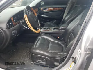 2005 Jaguar XJ Vanden Plas z VIN SAJWA82C15SG37427, wystawiony jako Copart lot #60749795 z przebiegiem 90 122 mil mil oraz Czysty tytuł • Clean title. Historia ofert i sprzedaży dostępna na DreamBid. Obrazek 7.