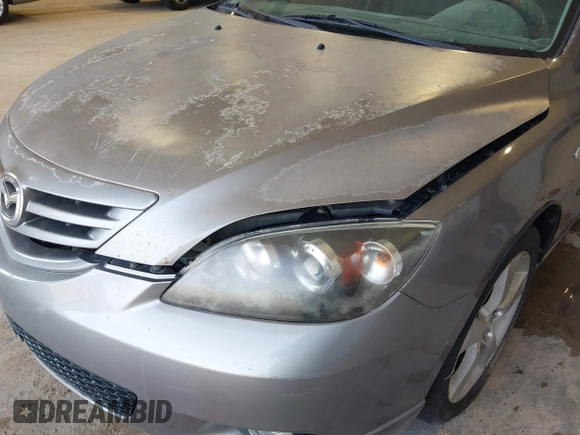 2004 Mazda 3 s with VIN JM1BK343441217463, listed as a IAAI auction lot 41957324 with 219,311 mi miles and . Bid and sale history available at DreamBid. Image 13.