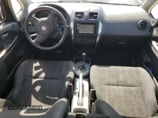 2010 Suzuki SX4 z VIN JS2YA5A32A6300486, wystawiony jako Copart lot #52340575 z przebiegiem 200 190 mil mil oraz Szkody całkowita. Historia ofert i sprzedaży dostępna na DreamBid. Obrazek 8.