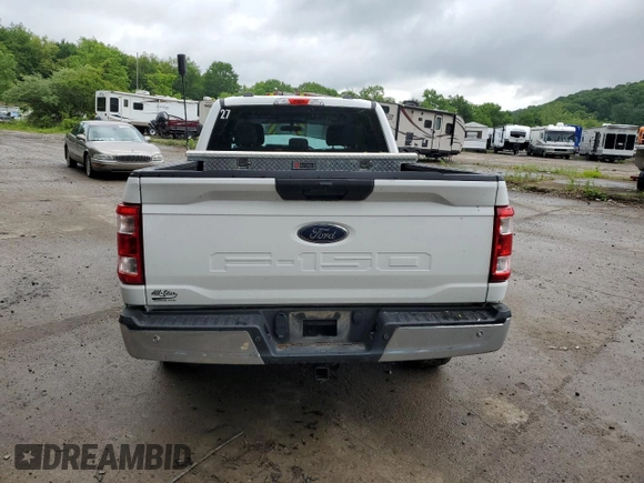 2021 Ford F-150 XL with VIN 1FTFX1E51MFC05216, listed as a Copart auction lot 56571785 with 94,584 mi miles and Salvage title. Bid and sale history available at DreamBid. Image 6.