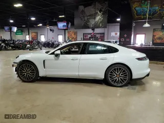 2022 Porsche Panamera with VIN WP0AJ2A75NL102179, listed as a Copart auction lot 58626814 with 7,100 mi miles and Salvage Title. Bid and sale history available at carsss.com. Image 3.