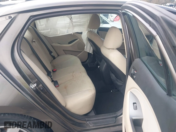 2015 Kia Optima LX with VIN 5XXGM4A72FG400848, listed as a IAAI auction lot 40802198 with 173,270 mi miles and . Bid and sale history available at DreamBid. Image 8.