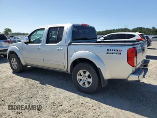 2005 Nissan Frontier LE z VIN 1N6AD07W95C443995, wystawiony jako Copart lot #61102285 z przebiegiem 248 740 mil mil oraz Czysty tytuł • Clean title. Historia ofert i sprzedaży dostępna na DreamBid. Obrazek 2.
