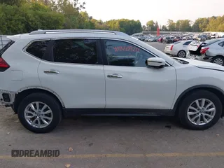 2017 Nissan Rogue S with VIN KNMAT2MTXHP524254, listed as a IAAI auction lot 40320920 with 157,321 mi miles and . Bid and sale history available at DreamBid. Image 14.