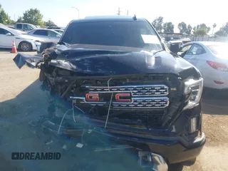 2019 GMC Sierra 1500 Denali z VIN 1GTU9FEL8KZ173809, wystawiony jako IAAI lot #42363300 z przebiegiem 75 425 mil mil oraz . Historia ofert i sprzedaży dostępna na DreamBid. Obrazek 13.