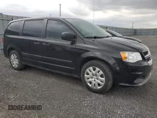 2015 Dodge Grand Caravan SE with VIN 2C4RDGBGXFR744203, listed as a Copart auction lot 54791795 with 216,594 mi miles and Clean Title. Bid and sale history available at DreamBid. Image 4.