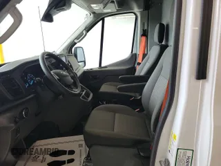 2023 Ford Transit Cargo with VIN 1FTBR1X86PKB99022, listed as a IAAI auction lot 42841650 with 14,234 mi miles and . Bid and sale history available at DreamBid. Image 4.