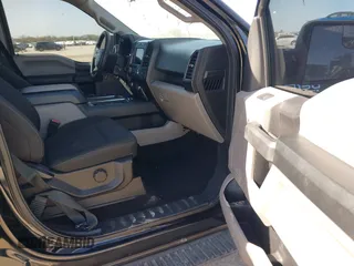 2018 Ford F-150 XL with VIN 1FTEW1E50JKE13640, listed as a IAAI auction lot 41228537 with 146,927 mi miles. Bid and sale history available at carsss.com. Image 5.