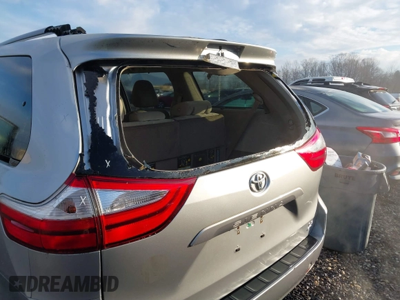 2017 Toyota Sienna LE with VIN 5TDJZ3DC6HS184126, listed as a IAAI auction lot 41166135 with 101,305 mi miles. Bid and sale history available at carsss.com. Image 6.