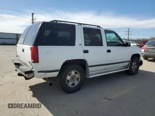 1999 GMC Yukon with VIN 1GKEK13R4XJ751482, listed as a Copart auction lot 48035075 with 154,800 mi miles and Salvage Title. Bid and sale history available at carsss.com. Image 3.