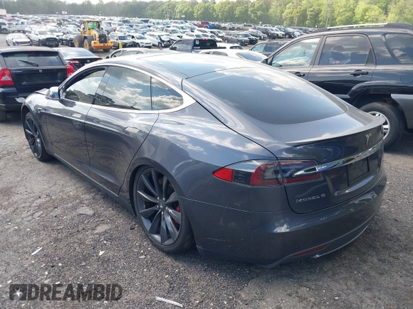 2014 Tesla Model S P85D with VIN 5YJSA1H29EFP63032, listed as a IAAI auction lot 42132145 with Not Provided miles and . Bid and sale history available at DreamBid. Image 3.